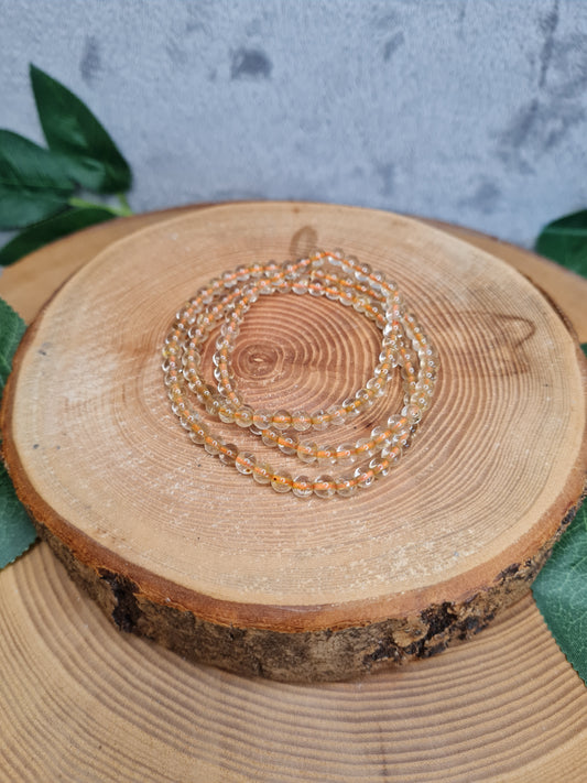 Rutilquarz 3-fach Kugelarmband